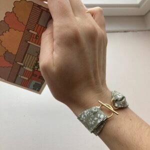 Bracelet tissu fermoir doré T